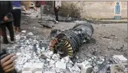  ?? IBAA NEWS AGENCY ?? Part of a Russian plane that was shot down by rebel fighters over northwest Idlib province in Syria on Saturday.