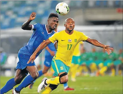  ?? Picture: REUTERS ?? PITCH BATTLE: South Africa’s Tokela Rantie is challenged by Cape Verde’s Carlos Rodrigues during their 2018 World Cup qualifying match in Durban last night