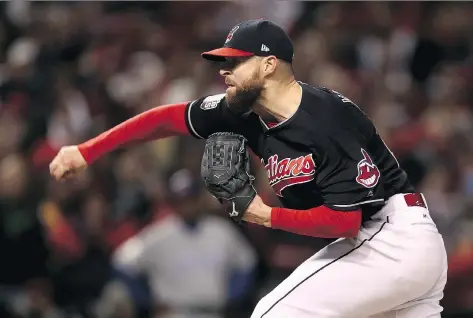  ?? ELSA/ GETTY IMAGES ?? Corey Kluber of the Indians has given up just two runs in 24 1/3 innings, striking out 29, and picking up three wins.