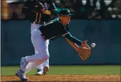  ?? RANDY VAZQUEZ — BAY AREA NEWS GROUP, FILE ?? The A’s Nick Allen (61) tosses a ball to second base during spring training in February 2020 at Lew Wolff Training Complex in Mesa, Ariz.