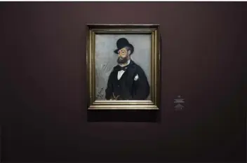  ?? PHOTOS BY LEWIS JOLY — ASSOCIATED PRESS ?? A portrait of Leon Monet by his brother Claude Monet on display as part of an exhibition showcasing the art of Leon Monet at the Musée du Luxembourg in Paris.