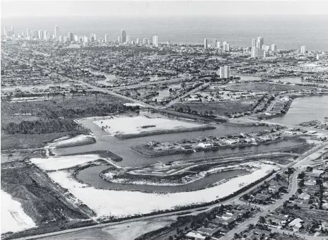  ??  ?? Broadbeach Waters being developed in 1989. Top right is Pacific Fair, before its 1991 expansion, and to its left is Jupiters Casino. The main road running down the centre of the photo is Bermuda St.