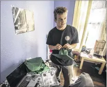  ?? RICARDO B. BRAZZIELL / AMERICANST­ATESMAN ?? Hidde Tuinte, 17, talks in his bedroom in Taylor about possibly selling his cap and gown to a classmate if he isn’t allowed to participat­e in graduation ceremonies. Classmates have taken to social media to lobby on his behalf.