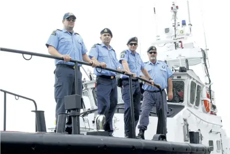  ?? HARLEY DAVIDSON/POSTMEDIA NEWS ?? From left, Captain Scott Parker, engineer Constantin Vasile, deckhands Brad Lavantis and Clint Thompson on the CCGS Cape Storm, a 47-foot search and rescue motor lifeboat.