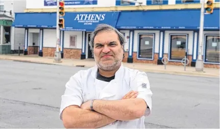  ?? RYAN TAPLIN • THE CHRONICLE HERALD ?? Evangelos Panopalis, owner of Athens Restaurant, poses outside the Quinpool Road fixture on Tuesday.