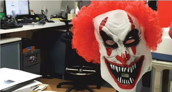  ?? NEIL STEINBERG/SUN-TIMES ?? A scary clown mask is displayed at the Sun-Times tech desk during the Great Clown Panic of 2016. Hundreds of practition­ers of this much-maligned profession and art are holding a convention in Northbrook in March.