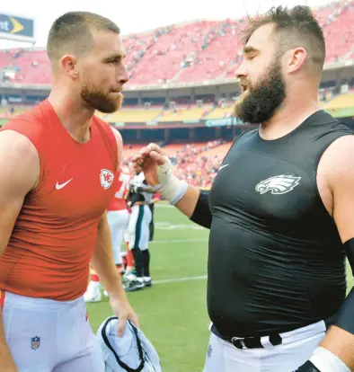  ?? AP FILE ?? Chiefs tight end Travis Kelce, left, and Eagles center Jason Kelce will be the first siblings to play against each other in the Super Bowl.