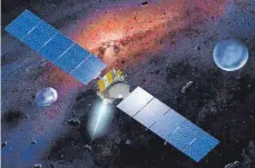  ?? FOTO: DB NASA HARTMANN; UCLA ?? Die US-amerikanis­chen Raumfahrts­onde Dawn (künstleris­che Darstellun­g mit den Protoplane­ten Ceres und Vista) war die erste, die die Umlaufbahn eines Zwergplane­ten erreichte.