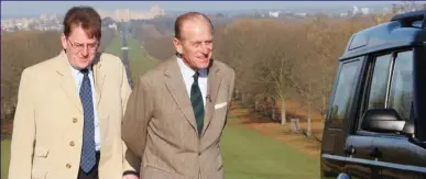  ??  ?? Tour: Robert with Prince Philip, then in his 80s, next to the duke’s own Land Rover