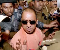  ?? PTI ?? Yogi Adityanath arrives to attend the BJP’s legislatur­e party meeting in Lucknow on Saturday. —