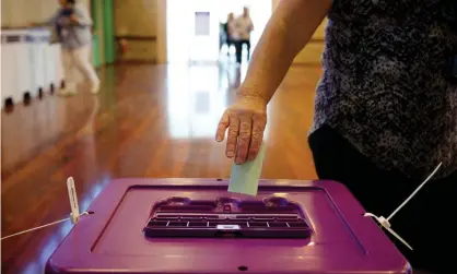  ??  ?? Voters would be asked to produce a driver’s licence, Medicare card or utility bill at polling places under a Coalition proposal. Photograph:Richard Wainwright/AAP