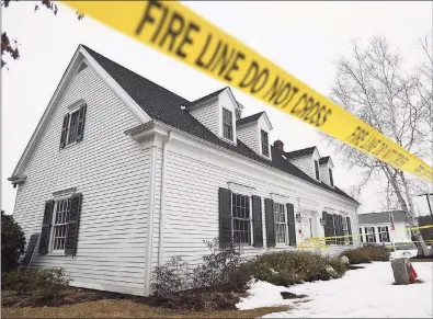  ?? Brian A. Pounds / Hearst Connecticu­t Media ?? Fire line tape surrounds the Roxbury Ambulance building, site of an arson investigat­ion at 27 North St. in Roxbury, on Sunday. Suspect Richard White, of Torrington, is currently in the custody of the Pennsylvan­ia State Police.