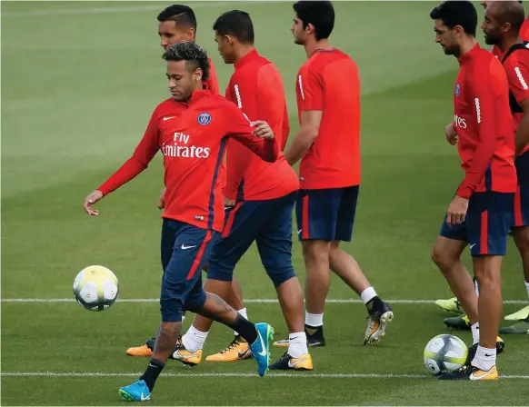  ?? EPA ?? Neymar, left, will trot out for the first time in France’s Ligue 1 as Paris Saint-Germain visit Guingamp today at Stade de Roudourou