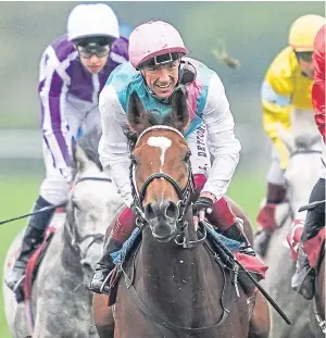  ?? Picture: Getty Images. ?? Frankie Dettori eases Enable down after steering John Gosden’s star to a second successive victory in the Qatar Prix de l’Arc de Triomphe at Paris Longchamp yesterday. Enable repelled the late charge of Sea Of Class to successful­ly defend her crown.