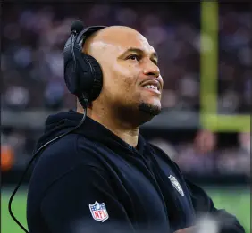  ?? WADE VANDEVORT (2023) ?? Then-las Vegas Raiders interim head coach Antonio Pierce stands on the field at Allegiant Stadium Nov. 5 against the New York Giants. Pierce, who was named head coach of the Raiders on Jan. 19, is one of nine minority head coaches who will be on the sidelines in 2024. The Seattle Seahawks and Washington Commanders have yet to name their new coaches.