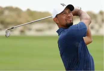  ?? CHRISTIAN PETERSEN/GETTY IMAGES ?? Tiger Woods was on his game in a bogey-free round of 65, eight strokes better than the day before in Nassau.