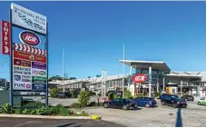  ?? PHOTO: DAVID MILLAR ?? NEW OWNERS: Wondall Road Village features an IGA supermarke­t, a BP service centre, a five-bay car wash and eight specialty stores.