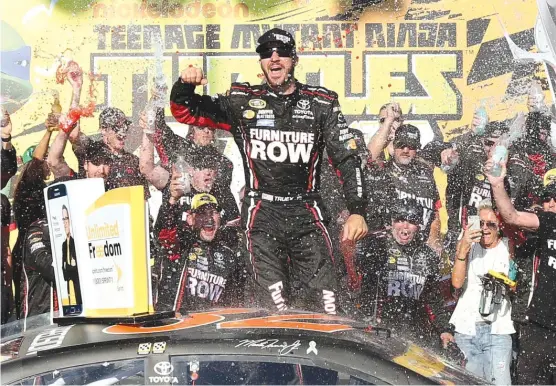  ??  ?? Martin Truex Jr. won the Cup race at Chicagolan­d Speedway last year and is the top seed entering the first event of NASCAR’s 10- race playoffs. | KENA KRUTSINGER/ GETTY IMAGES