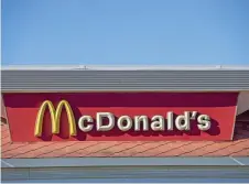  ?? — AFP photos ?? McDonald’s announced it will hike wages at US company-owned restaurant­s as it seeks another 10,000 employees.