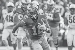  ?? ?? After receiver Jaxon Smith-njigba's record-setting performanc­e in the Rose Bowl, Ohio State's passing attack is expected to be strong again next season.