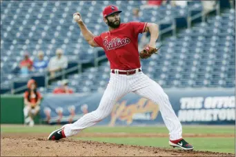  ?? FRANK FRANKLIN II — THE ASSOCIATED PRESS ?? Phillies starting pitcher Jake Arrieta delivers a pitch during a spring training game. Arrieta underwent offseason surgery and is expected to be the team’s No. 3 starter.