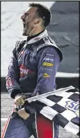  ?? SARAH CRABILL / GETTY IMAGES ?? Austin Dillon celebrates after winning Sunday’s Coca-Cola 600 at Charlotte Motor Speedway.