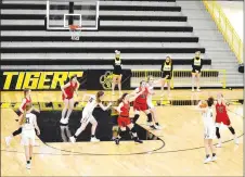  ?? MARK HUMPHREY ENTERPRISE-LEADER ?? Prairie Grove junior Trinity Dobbs gets an open look from 3-point territory. Dobbs scored 19 points in the Lady Tigers’ 65-38 loss to Pea Ridge in 4A-1 Conference girls basketball action at Tiger Arena on Tuesday, Feb. 9.