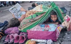  ?? FOTO: REUTERS ?? Allan Jose (10) aus Honduras macht in Tapachula, Mexiko, Rast.