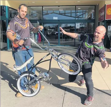  ??  ?? UP FOR GRABS: Goolum Goolum Aboriginal Co-operative youth justice worker Craig Tanner, right, with Deadly Connection­s worker, and dragster builder, Paul Britten.