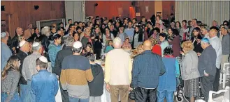  ??  ?? JOINT WORSHIP: The Kiddush at Wynberg Synagogue, in which Jews and Muslims participat­ed