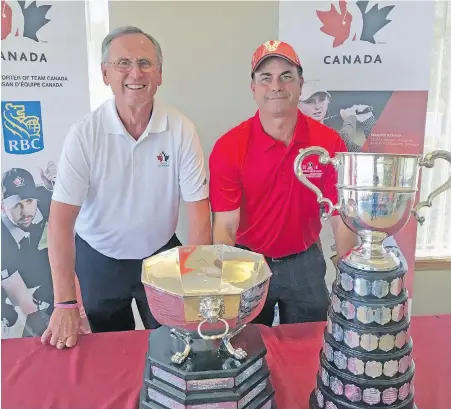  ?? TIMES COLONIST ?? 2018 Canadian men’s amateur tournament chairman Bill Klein, left, and Duncan Meadows course superinten­dent Dave Brummitt help show off the individual trophy, left, and Willingdon Cup team trophy Monday at Duncan Meadows.