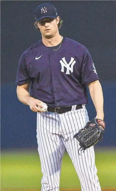  ?? GETTY ?? With no time to waste, Gerrit Cole treated Tuesday night’s intrasquad scrimmage as a real game, and looked sharp over five innings.