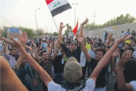  ?? AFP ?? Iraqis in Basra protest against power shortages and corruption, which were big issues in the spring election campaign