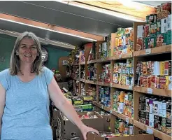  ??  ?? New Plymouth Foodbank manager Sharon Wills has been overwhelme­d by the generosity of the city’s residents in response to its annual Christmas Food Drive.
