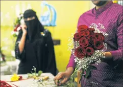  ??  ?? A real change: A Saudi florist preparing a Valentine’s bouquet last week.