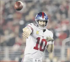  ?? Ezra Shaw / Getty Images ?? Giants QB Eli Manning faces former teammate Jason Pierre-paul for the first time Sunday. Pierre-paul said, “I’m coming Eli. Just letting you know.”