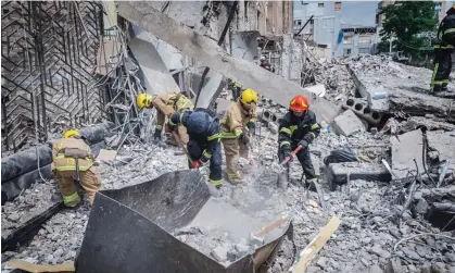  ?? ?? The aftermath of a rocket strike in downtown Kramatorsk, in which at least 10 people were killed. Photograph: State Emergency Service Handout/EPA