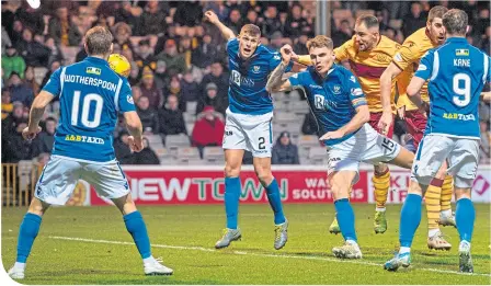  ??  ?? Peter Hartley heads home to double Motherwell’s advantage at Fir Park