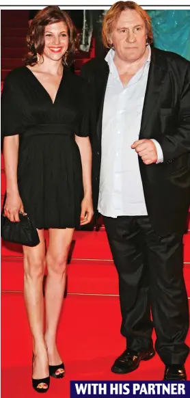  ??  ?? WITH HIS PARTNER Controvers­ial figure: Gerard Depardieu with Clementine Igou