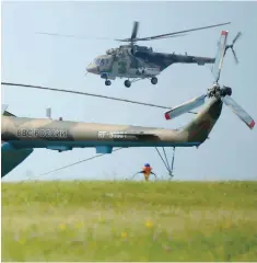  ??  ?? Russian Air Force helicopter­s