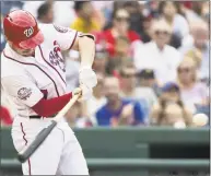  ?? Scott Taetsch / Getty Images ?? The Nationals’ Trea Turner hits a two-run home run against the Mets during the third inning at Nationals Park on Saturday in Washington.