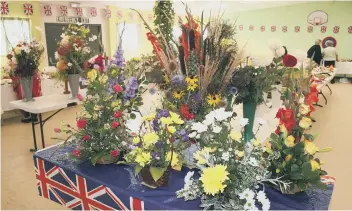  ??  ?? The flower arranging exhibits at Herrington Village Show.