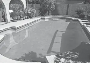  ?? ?? The garden was originally a swimming pool. But when their 9-year-old Chihuahua, Zorro, suffered a seizure, fell into the pool and drowned, they immediatel­y got rid of it. “I didn’t want to lose another life that way,” Candy said.