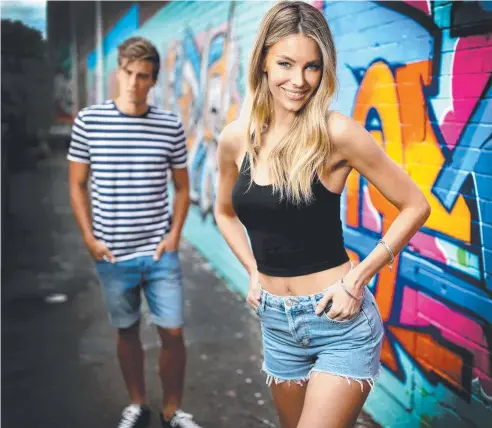  ?? Picture: GREGG PORTEOUS ?? TOUGH TIMES: Jennifer Hawkins models for Topshop. The fast fashion chain’s Australian operations are in strife.