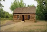  ?? BETH J. HARPAZ — THE ASSOCIATED PRESS ?? A cabin that Theodore Roosevelt lived in, open to visitors at Theodore Roosevelt National Park in Medora, N.D.