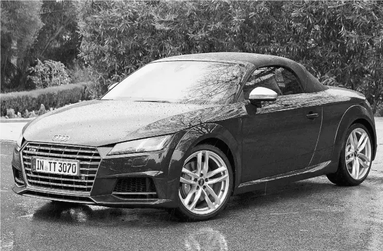  ?? Photos : Graeme Fletcher / Driving ?? The new Audi TTS’s powered soft top opens and closes in 10 seconds and at speeds of up to 50 kilometres an hour. It can also be operated remotely via the key fob.