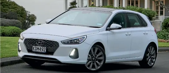  ??  ?? The new Hyundai i30, showing off the brand’s latest iteration of its fluidic sculpture design strategy.