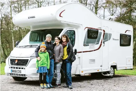  ?? Photograph by Lauren Maccabee ?? The Meek family with their travelling home.