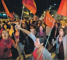  ?? Ezequiel Becerra AFP/Getty Images ?? DEMONSTRAT­ORS turn out in San Jose, Costa Rica, on Friday to support the women who have accused former President Oscar Arias of sexual abuse.