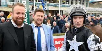  ??  ?? Jonathan Moore with golf star Shane Lowry (left) after riding Theatre of War at Leopardsto­wn in December.